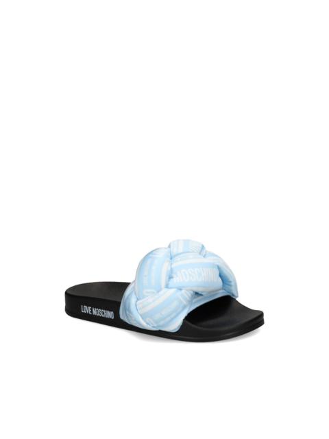 Moschino printed flip flops