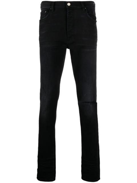 AMIRI distressed skinny jeans