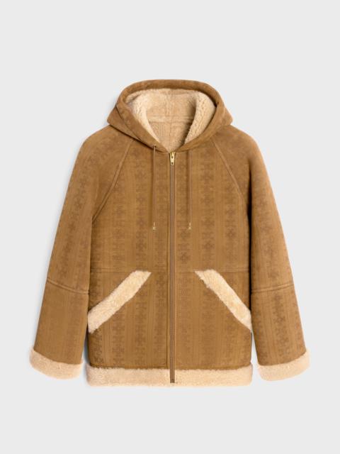CELINE hooded parka in triomphe curly lambskin