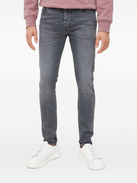 GUESS USA Chris triangle-logo jeans