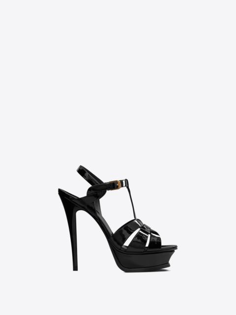 SAINT LAURENT tribute platform sandals in patent leather