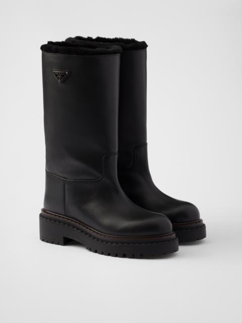 Prada Leather and shearling boots