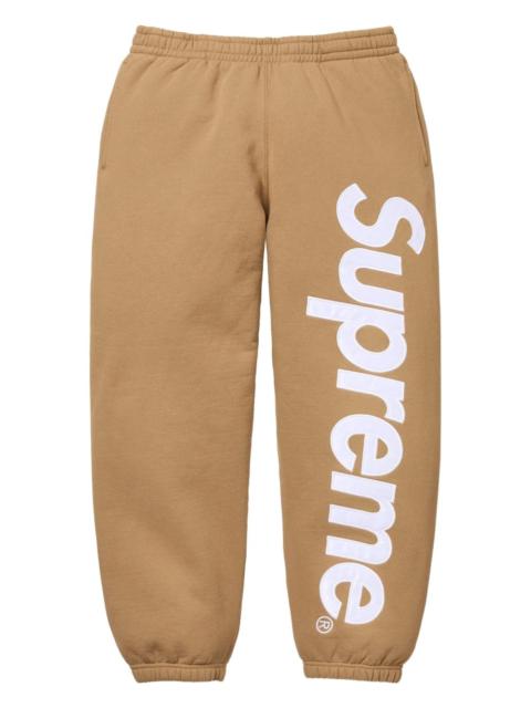 Supreme satin-appliqué track pants