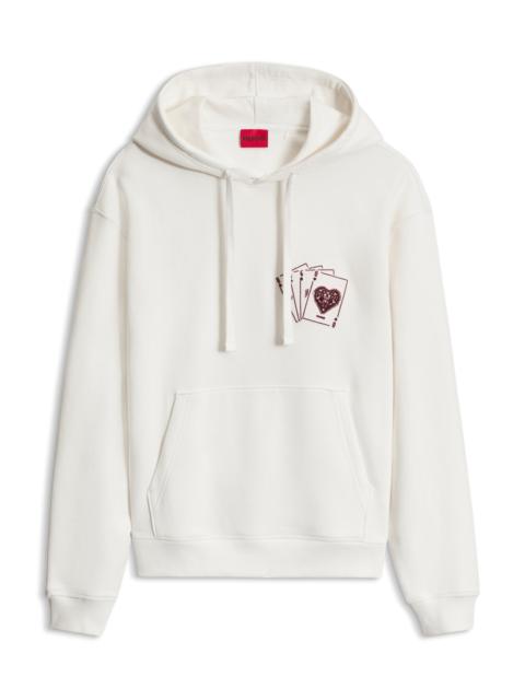 HUGO GRAPHIC-PRINT COTTON HOODIE IN A RELAXED FIT