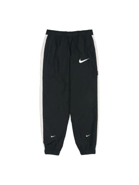 Nike 남자 나이키 운동복 SWSH 바지 WVN 검정 DJ4133-010로 나이키