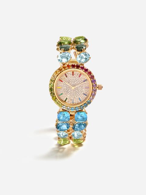 Watch with multi-colored gems