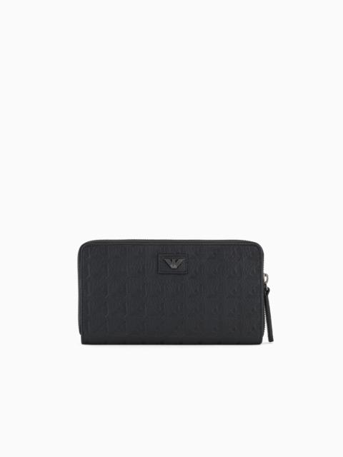 EMPORIO ARMANI ZIP-AROUND LEATHER WALLET WITH ALL-OVER EMBOSSED EAGLE
