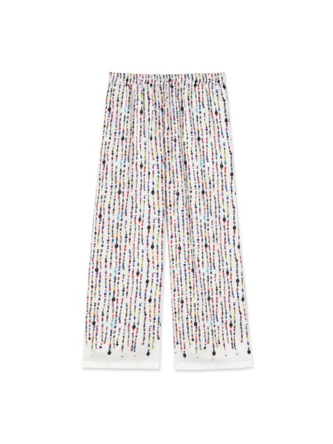 MSGM Fluid fabric pants with beaded print