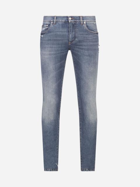 Stretch skinny jeans with small abrasions