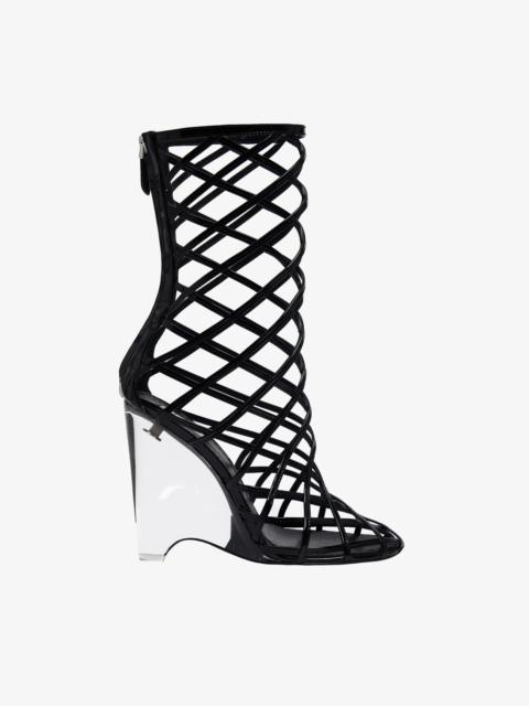 Alaïa LA CAGE WEDGE BOOTIES IN PATENT LAMBSKIN