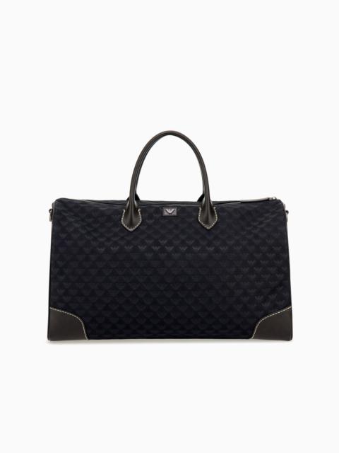 EMPORIO ARMANI DUFFLE BAG WITH A GEOMETRIC PATTERN AND LEATHER HANDLES