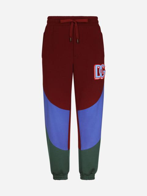 Dolce & Gabbana Mixed-fabric jogging pants with DG patch