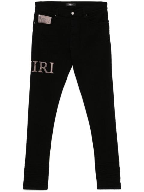 AMIRI Snake Logo jeans