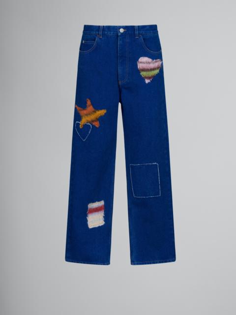 BLUE COATED DENIM JEANS WITH MOHAIR PATCHES