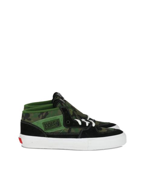 Vans camouflage-print lace-up sneakers