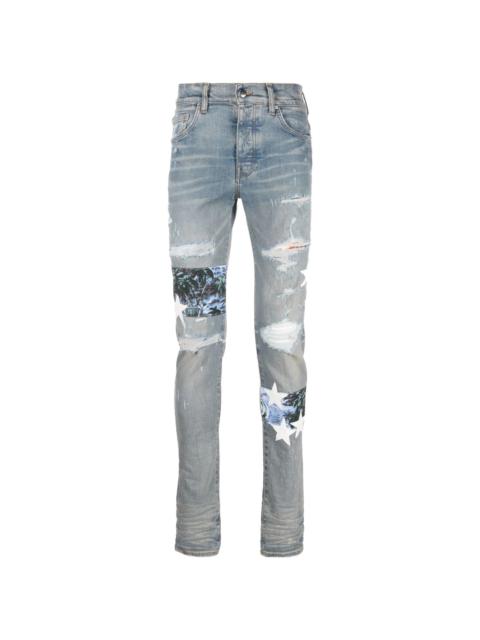 AMIRI distressed-effect star patch skinny jeans