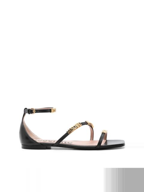 Moschino logo-lettering leather sandals