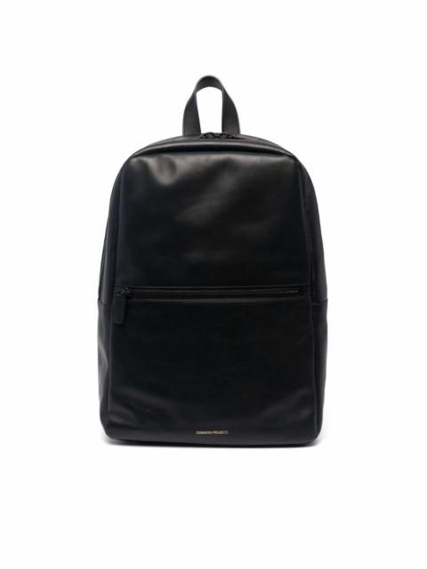 Common Projects engraved-logo leather backpack