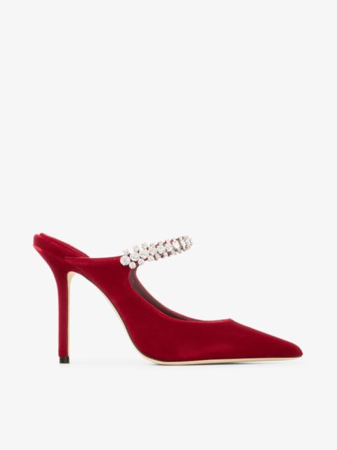JIMMY CHOO Bing 100
Ruby Red Velvet Mules with Crystal Embellishment