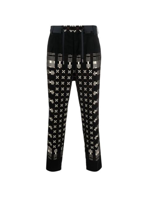 graphic-print tapered-leg trousers