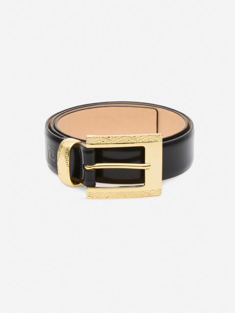 MAGDA BUTRYM Engraved rectangular buckle belt in black and gold