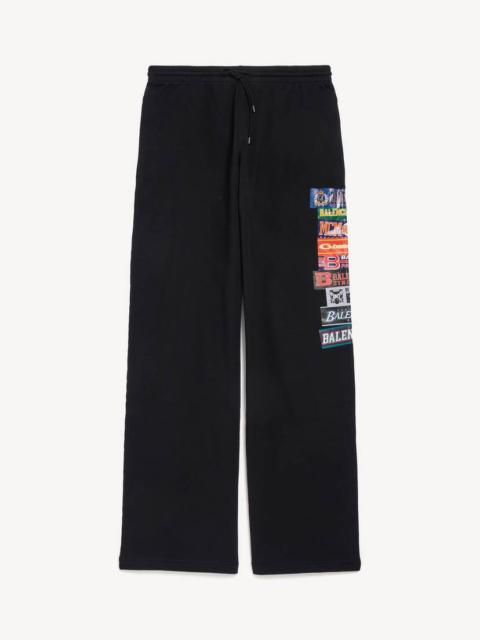 BALENCIAGA Men's Bumper Stickers Baggy Sweatpants in Black