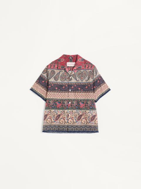 Valentino BOWLING SHIRT IN COTTON MUSLIN WITH VOYAGE IMAGINAIRE PRINT AND PASSEMENTERIE TRIMS