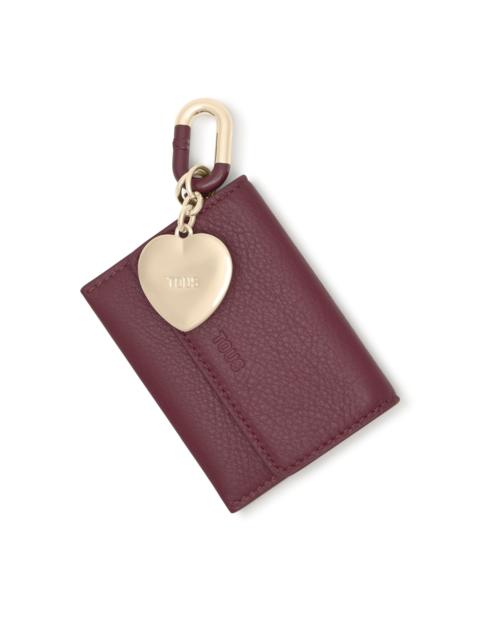 TOUS Set of burgundy and gold-colored Key ring pendants and Change purse Hold
