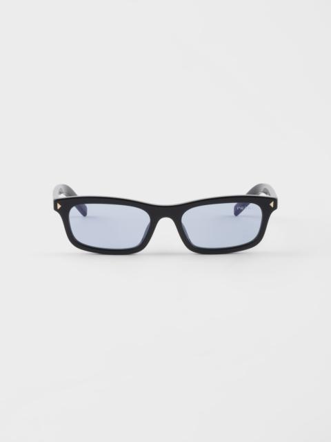 Prada Sunglasses with the iconic metal plaque