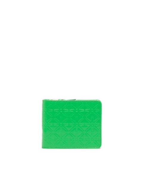 Comme Des Garçons embossed leather wallet