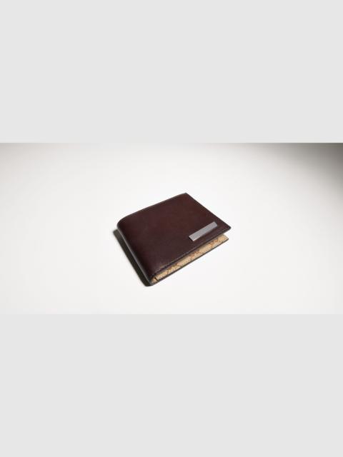 GUCCI Bi-fold wallet with metal tag