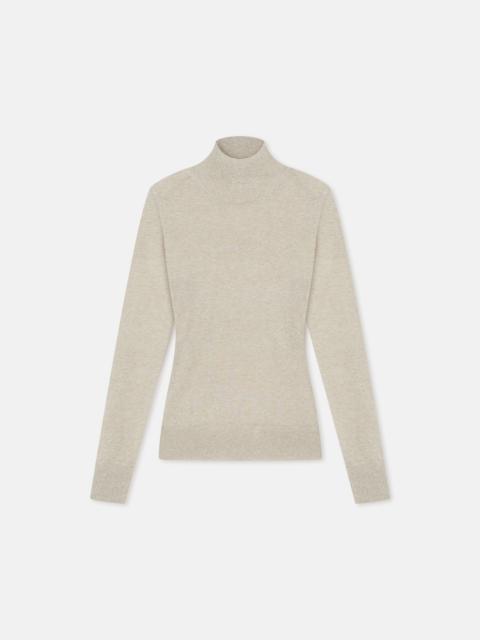 AERON VASLAV
Sparkly ribbed turtleneck