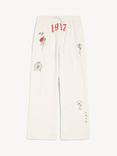 BALENCIAGA Men's Tattoo Baggy Sweatpants in Cream