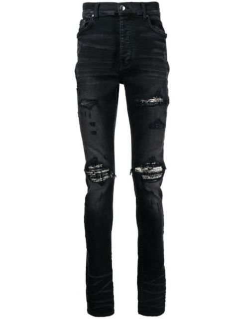 AMIRI distressed skinny jeans