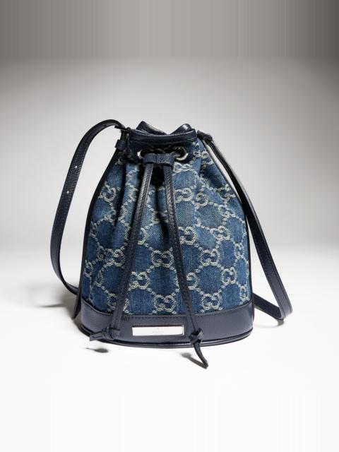 GUCCI Mini bucket bag with Gucci plaque