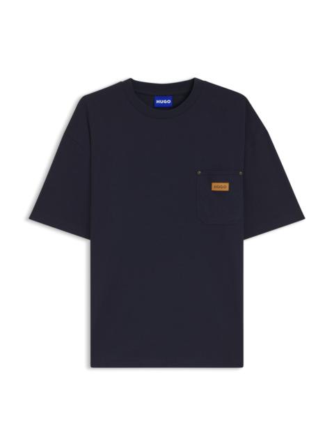 HUGO LOOSE-FIT T-SHIRT IN COTTON WITH SUEDE LOGO BADGE