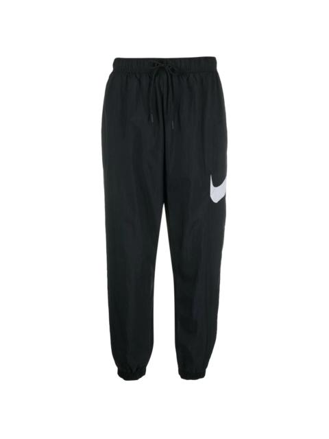 Nike swoosh-print track pants