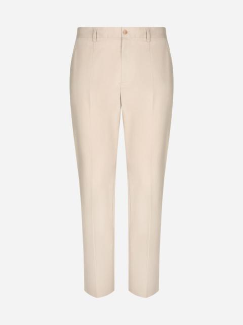 Stretch cotton pants with branded tag