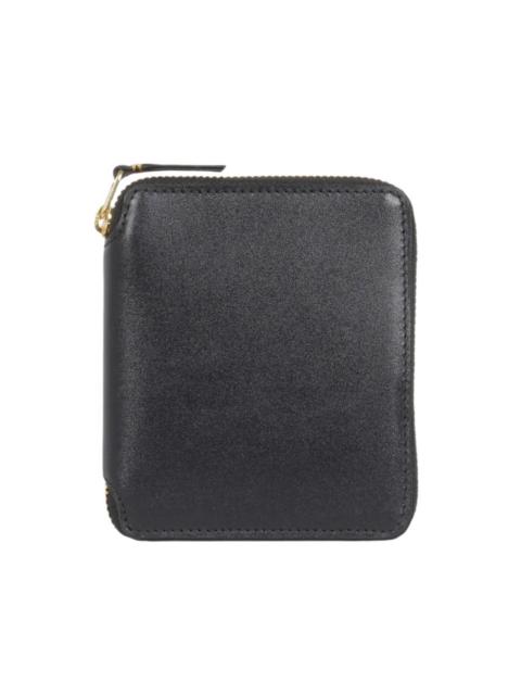 Comme Des Garçons leather wallet