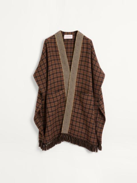 Valentino WOOL CAPE WITH JACQUARD TRIM AND TASSELS ON THE HEM