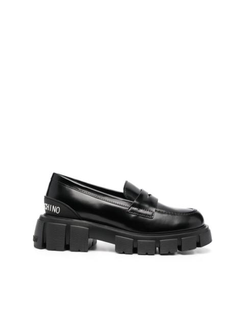 Moschino embossed-logo leather loafers