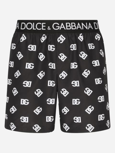 Mid-length swim trunks with all-over DG logo print