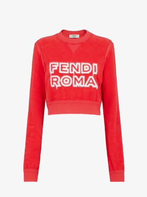 FENDI Long-sleeved cropped sweatshirt. Made of red jersey decorated with the Fendi Roma logo reinterpreted