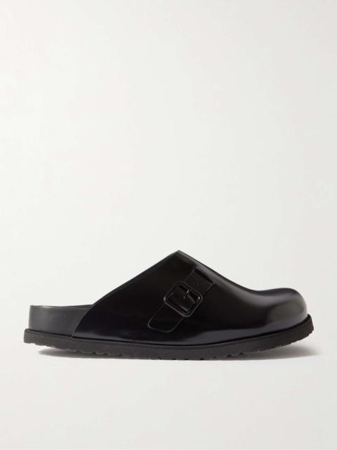 Niamey Buckled Glossed-Leather Clogs