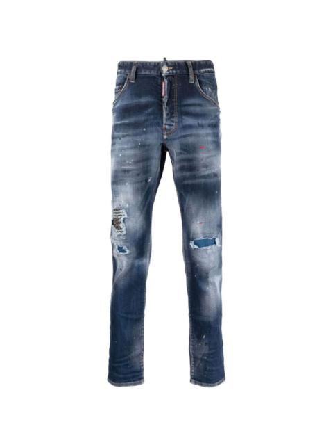 distressed paint splatter jeans