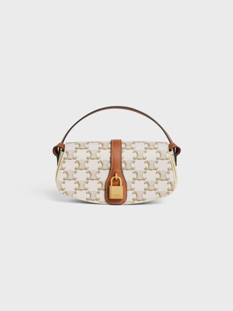 CELINE CLUTCH ON STRAP TABOU in Triomphe canvas and calfskin