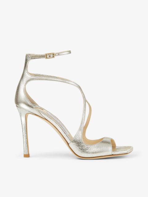 JIMMY CHOO Azia 95
Champagne Glitter Leather Sandals