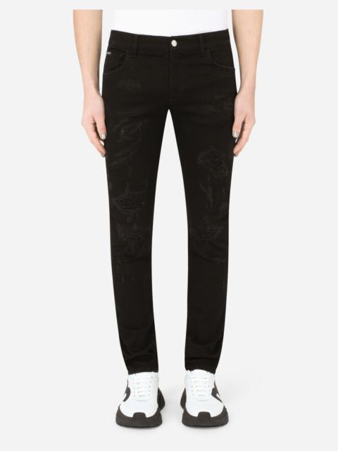 Dolce & Gabbana Black slim-fit stretch jeans with repaired rips