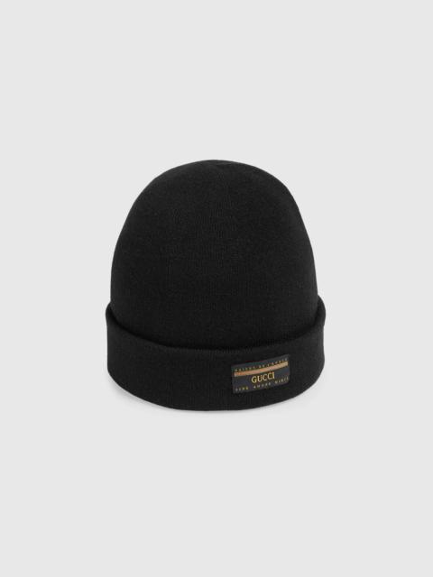 GUCCI Wool hat with Gucci label