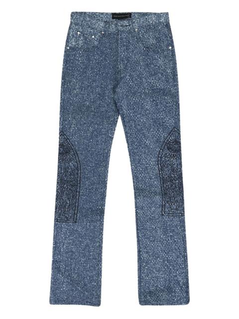 WHO DECIDES WAR textured-finish jeans